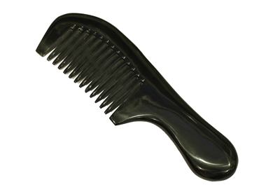 A buffalo horn comb with handle.